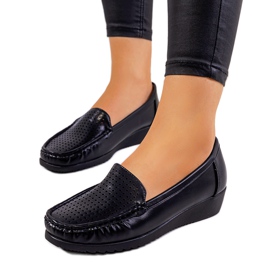 Mocassins noirs sur le talon compensé Dalal