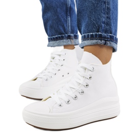 Baskets blanches sur une semelle haute Tirado
