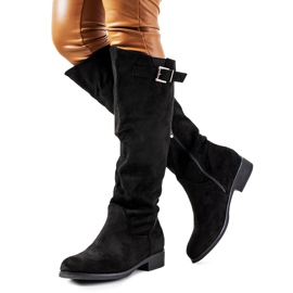 Bottes isolées plates noires de Louise le noir