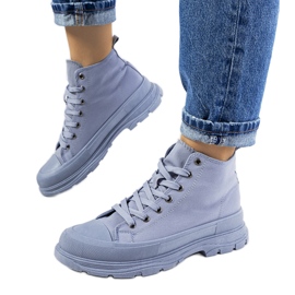 Baskets montantes bleues sur la plateforme Boyes Baskets montantes bleues sur la plateforme Boyes