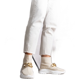 Baskets beiges avec chaîne Taryn