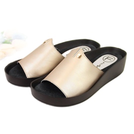 Chaussons compensés dorés femme en cuir Filippo