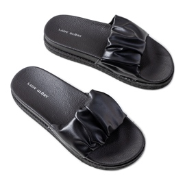 Chaussons noirs sur la plateforme Baldwin