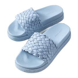 Tongs bleues sur la plateforme Kapper