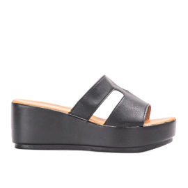 Chaussons noirs sur la plateforme Duffel