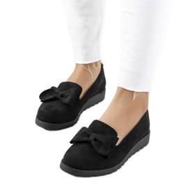 Chaussures noires sur le coin Poolse