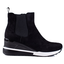 Bottes de sport pour femmes Vinceza sur un coin noir