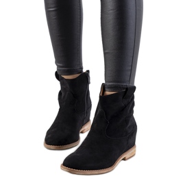 Bottes noires sur un talon compensé intérieur Hunjet le noir