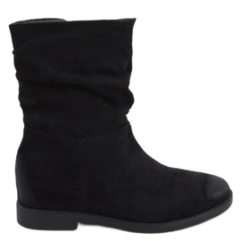 Bottes sur un coin caché Bansi Black le noir