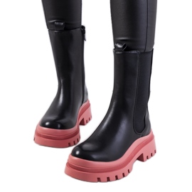 Bottes noires sur la plateforme Ruket rose