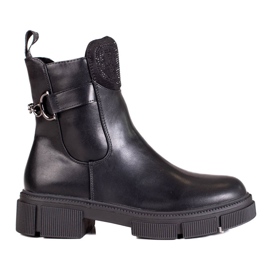Bottes noires pour femmes sur la plate-forme le noir