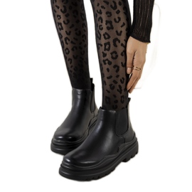 Bottes noires sur la plateforme Tausel