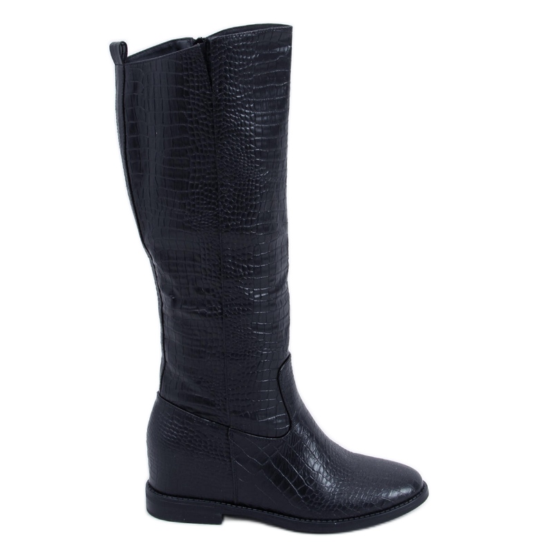 Bottes sur le coin caché de Solange Black le noir