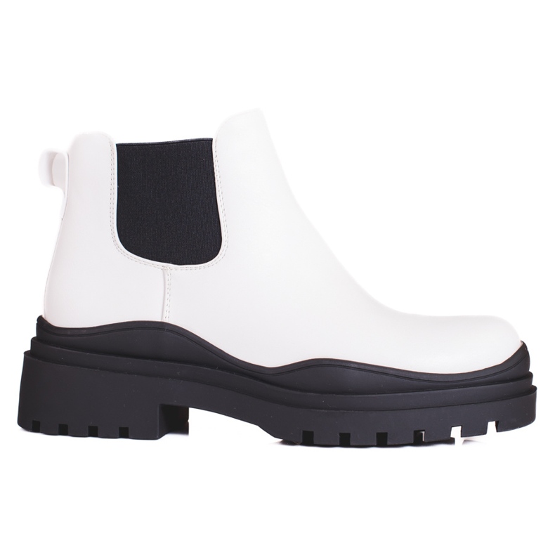 Bottines Chelsea noires et blanches pour femmes sur la plateforme