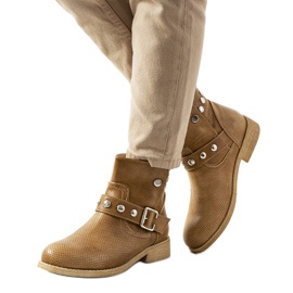 PA1 Poinçons bottes marron brun