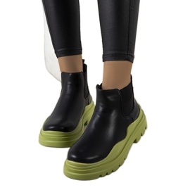 Bottes noires sur la plate-forme Tausel verte