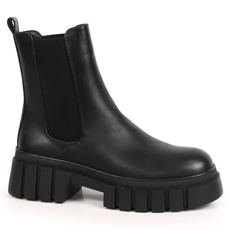 Bottes Chelsea noires pour femmes sur la plate-forme, isolées noires Sergio Leone le noir Bottes Chelsea noires pour femmes sur la plate-forme, isolées noires Sergio Leone le noir