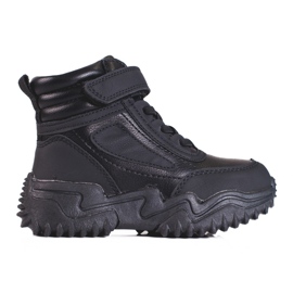 Bottes garçons isolées noires le noir