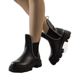 BM Bottes noires sur une semelle de tracteur de Fermo