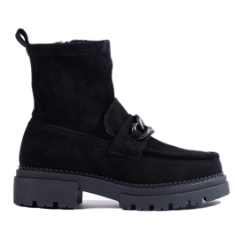 Bottes noires pour femmes sur la plate-forme