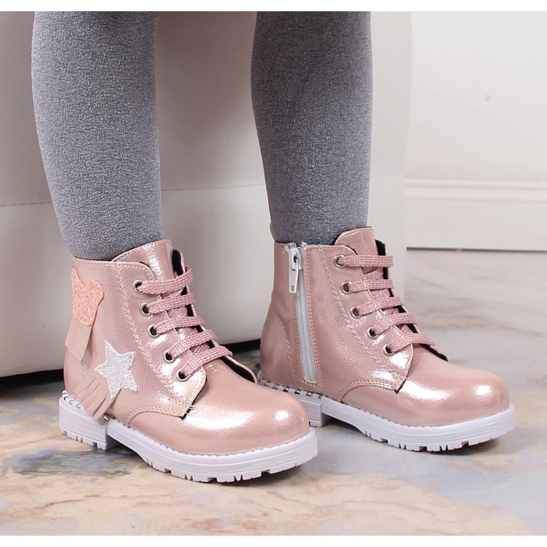 Bottes isolées rose brillant fille Potocki