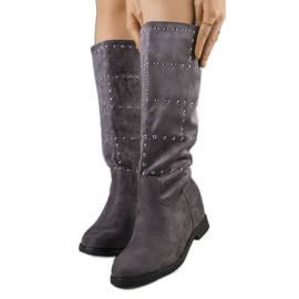 Bottes de coin gris avec goujons
