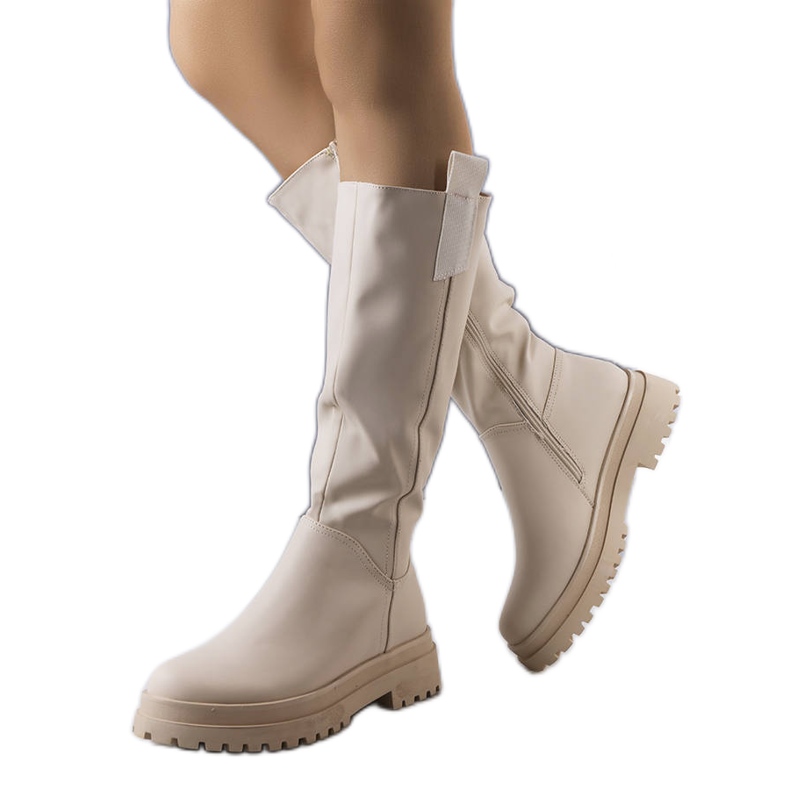 Bottes beiges isolées de Campoli