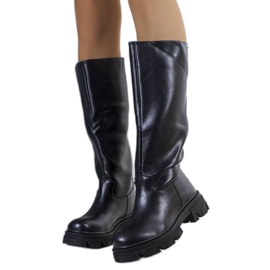 Bottes isolées noires de Romelio le noir