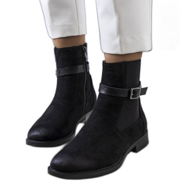 Bottes isolées noires de Tasso le noir