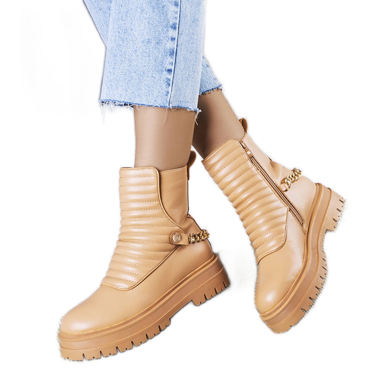 Bottes isolées beiges avec chaîne Pareda