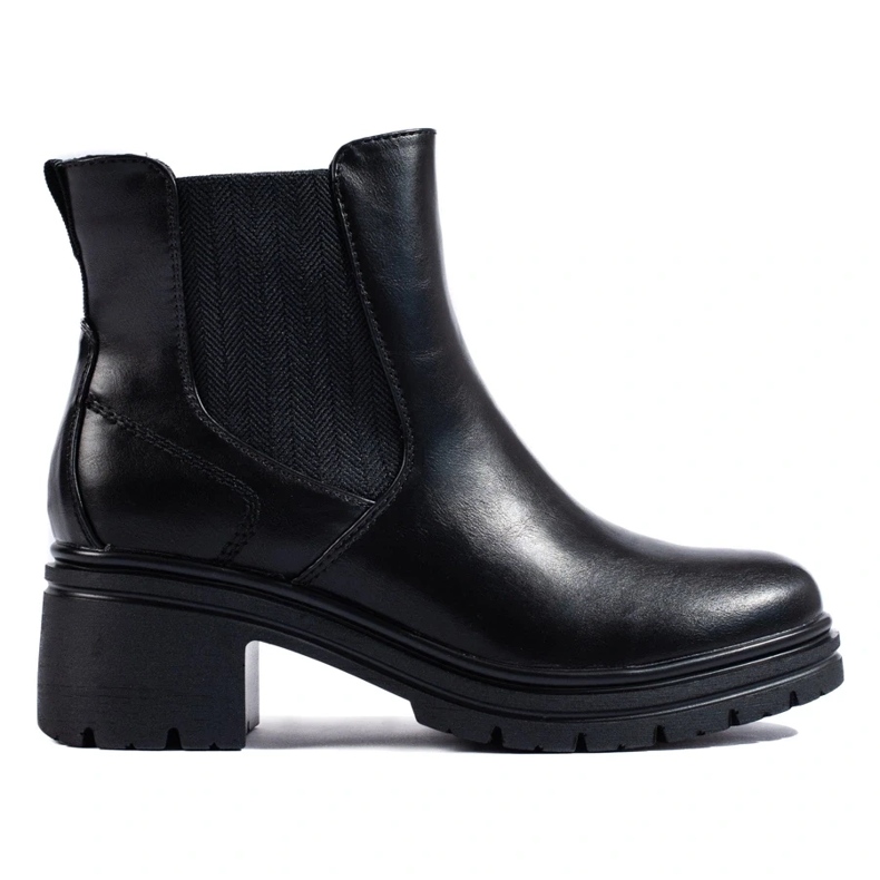 Bottines Chelsea noires pour femme sur le poteau le noir