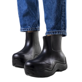 Bottes en caoutchouc noir sur une semelle Frolo haute le noir