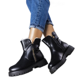 Bottes isolées noires avec fourrure de Teris le noir