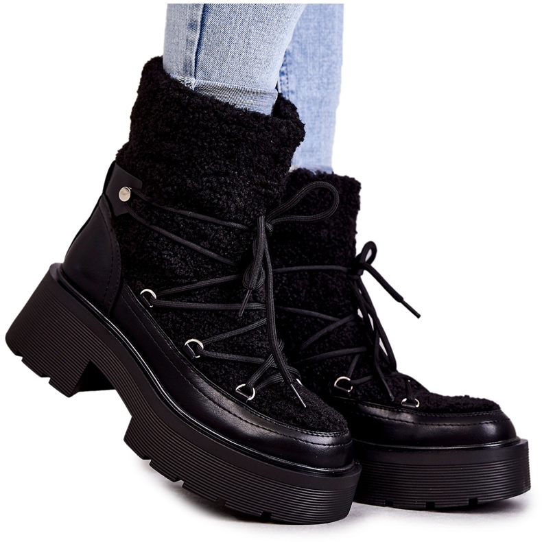 Bottes de neige pour femmes avec un manteau noir de mouton le noir