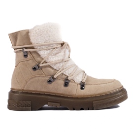 Bottes de neige beiges pour femmes avec un manteau en peau de mouton