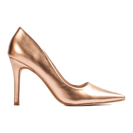 Talons hauts dorés pour femmes