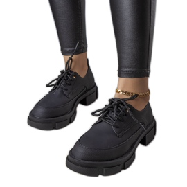 Chaussures noires à semelle massive de Kay le noir