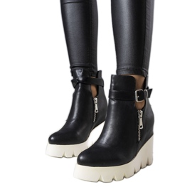 Bottes compensées noires de Sherri le noir