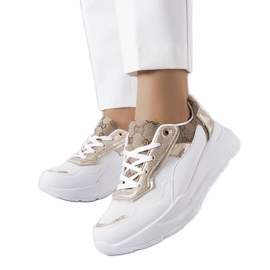 Baskets blanches avec inserts dorés de Lebrun