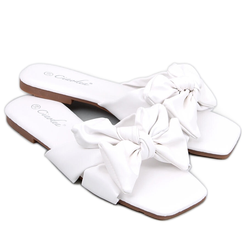 BM Minnen Chaussons noeuds blancs blanche