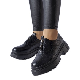 Brogues noires avec gaufrage de Travers