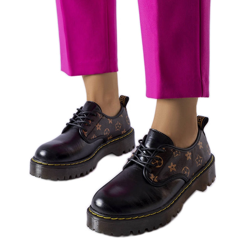 Bottines Eugenia noires avec empiècements marron le noir