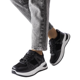 Baskets noires en matériaux combinés de Caya le noir