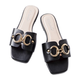 Claquettes élégantes noires avec chaîne de Corbin