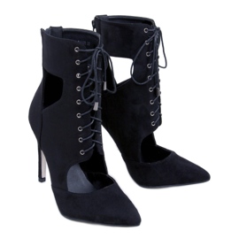 Boots découpées sur un pin Demi Nero le noir