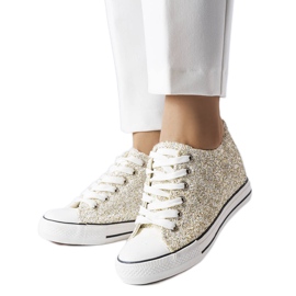 Baskets dorées à semelle compensée basse de chez Garceau