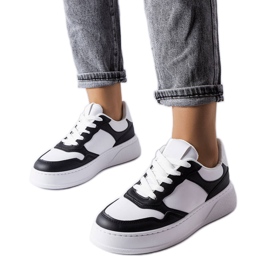 Bottes noires et blanches avec une semelle plus épaisse de Baron