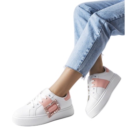 Baskets blanches ornées d'une boucle Ike rose