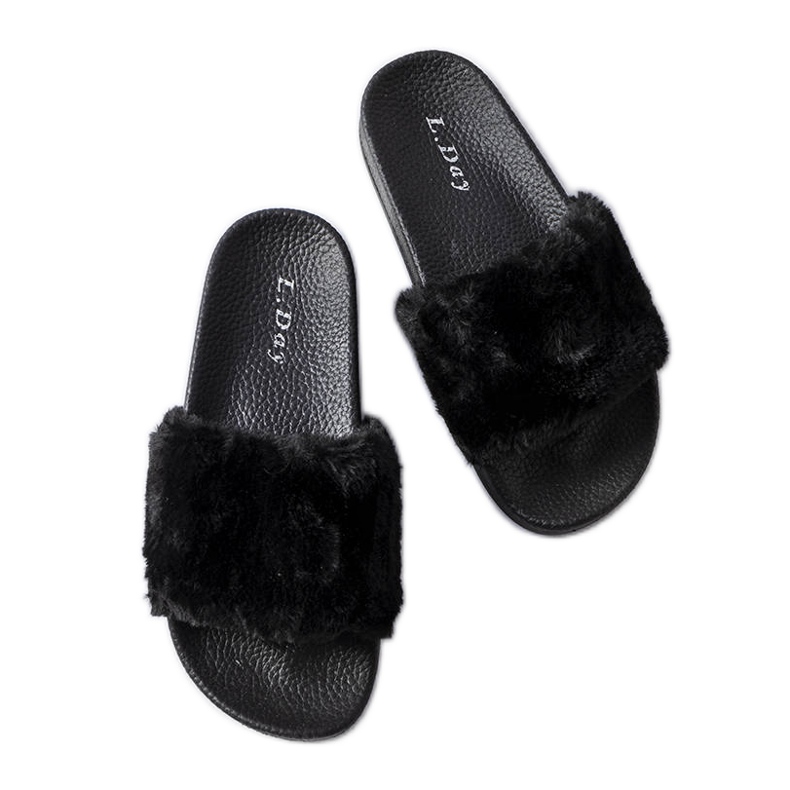 Claquettes noires avec fourrure ivoire le noir