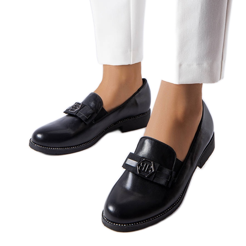 Mocassins noirs décorés d'un arc et de strass le noir